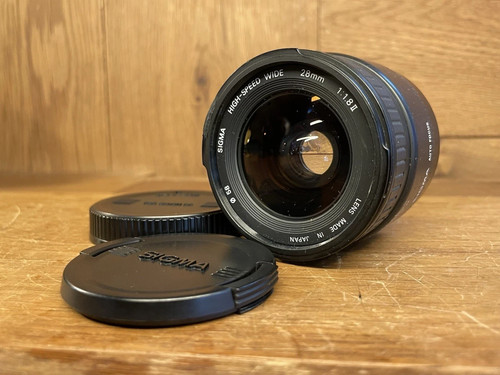 Near mint sigma aspherical - near,